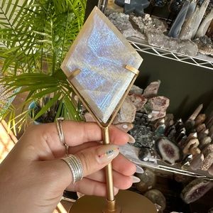 Moonstone diamond in gold stand